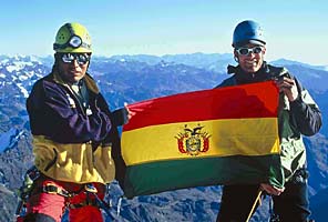 Bolivian guide and IMG guide Ben Marshall on top on Huayna Potesi in Bolivia