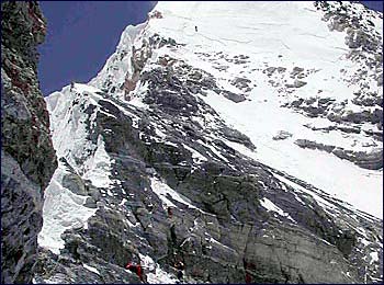 IMG guides performing a rescue high on Everest