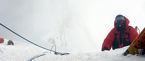 Climber on the Hillary Step, Everest Expedition with International Mountain Guides, photo by Justin Merle