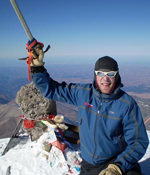 IMG Guide Mike Hamill on the summit of Mt. Elbrus in Russia