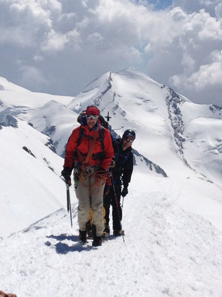 Team members approaching the summit of the Breithorn in Zermatt. Behind them is another 4,000 meter peak, Pollux. Members also climbed this peak, of which the trail is just visible. (Photo: Liz Smart)