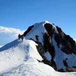 Climbing over the summit of Tarija Peak en route to Pequeno Alpamayo (Viki Tracey) Climbing over the summit of Tarija Peak en route to Pequeno Alpamayo (Viki Tracey)
