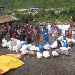 Sorting porter loads in Sama (Phunuru Sherpa)