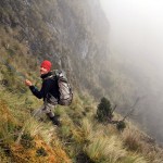 Rappelling the mud hill just below our high camp (photo: Dan Zokaites)