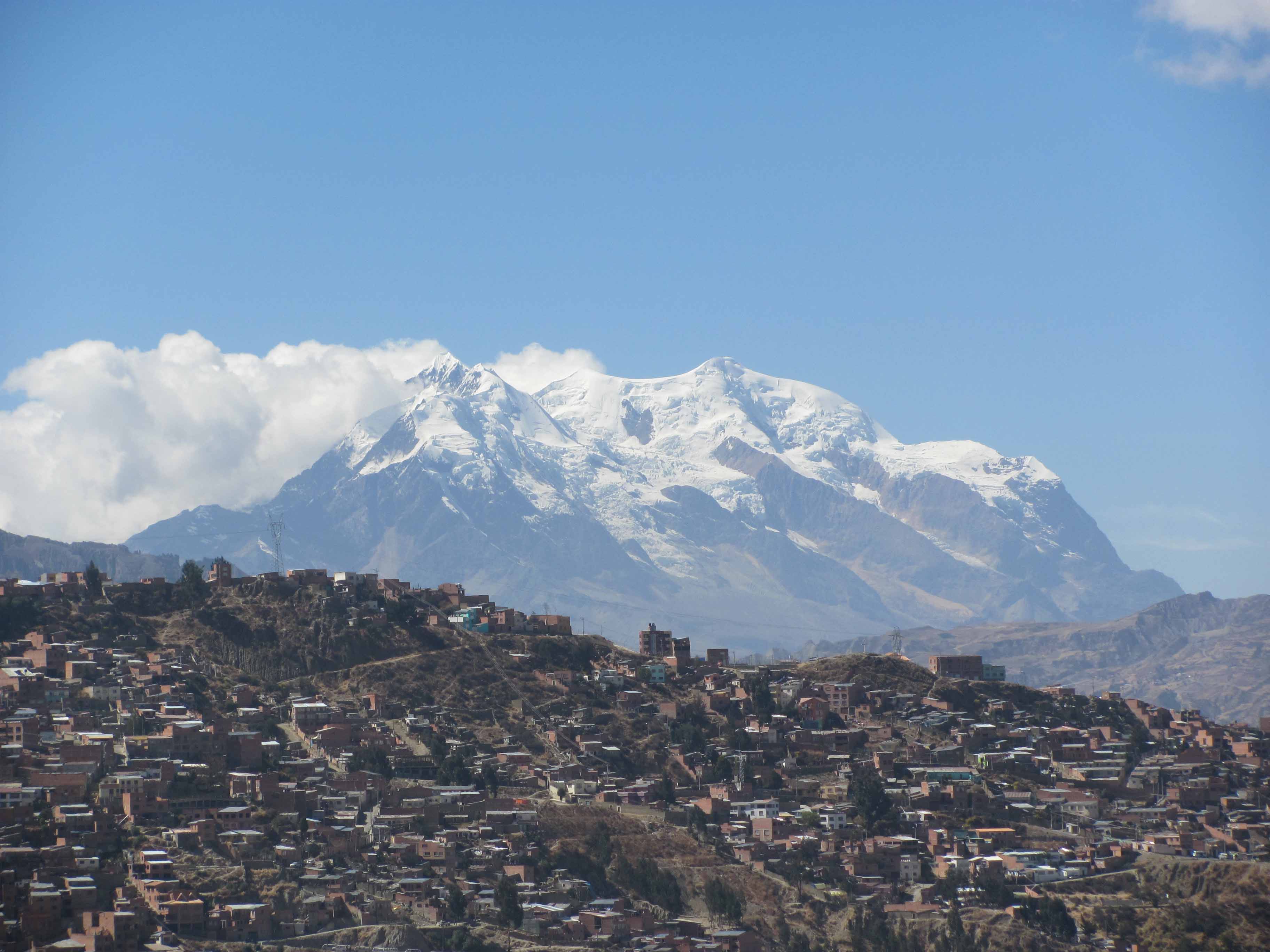 Illimani is just plain big! Over 21,000 feet high, the mountain towers 9000 feet above La Paz, about 25 miles away. (Greg Vernovage)