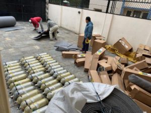 Repackaging oxygen for the trip to Base Camp on a yak (Ang Jangbu Sherpa)