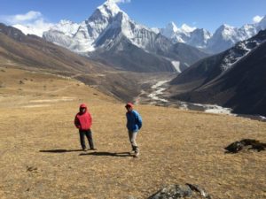 Sonam and Phunuru looking down the valley towards Pheriche_and Ama Dablam (Eric Simonson)