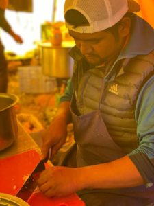 Purna prepping dinner (Jonathan Schrock)