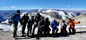 High winds at Nido de Condor didn't stop the team from taking a stroll and getting a team photo (Nickel Wood)