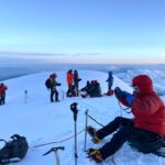 Last break before the summit on Cotopaxi at sunrise (Kim Sieradzki)